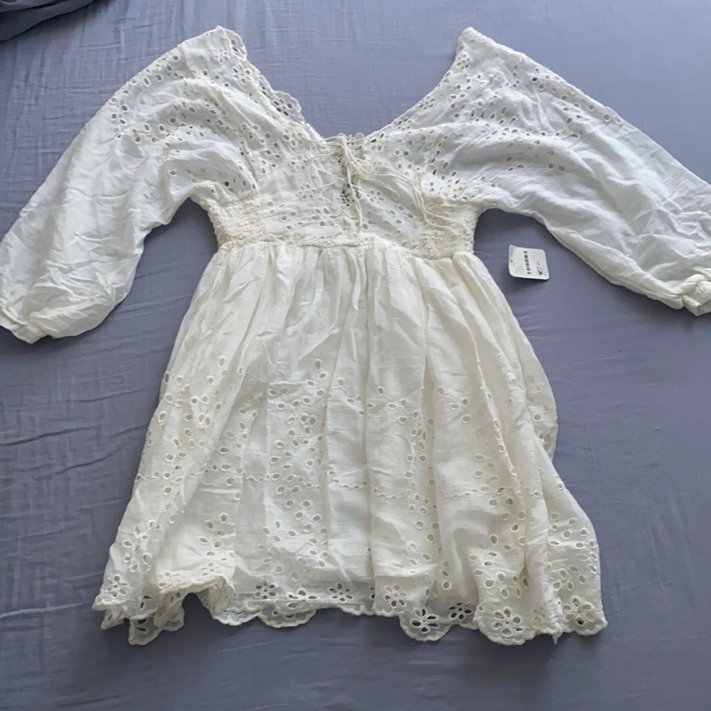 Free People ivory embroidered mini dress.